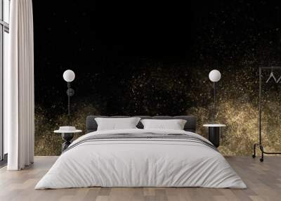 Gold glitter powder splash on black background Wall mural