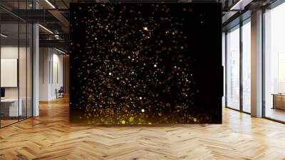 Sparkling golden glittering effect isolated on black background. Wall mural