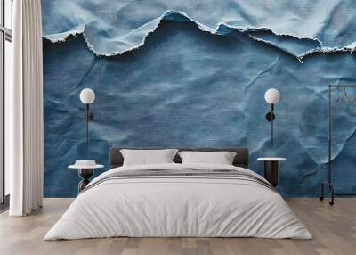 A textured blue background with torn edges. Wall mural