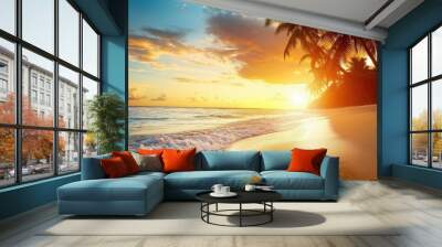 Beautiful view tropical coast with palm trees and sandy beach at sunset Wall mural