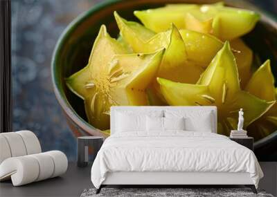 Close up bowl of sliced star fruit Wall mural