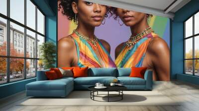 closeup portrait of two fashionable joyful black woman with short haircut and rainbow hair  in rainbow dress on pure rainbow  background cinematic light Wall mural