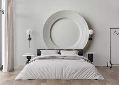 Empty plate on white surface Wall mural