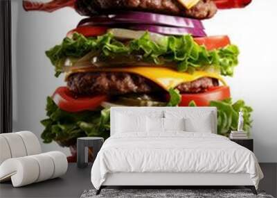 A giant hamburger is piled high with multiple layers of ingredients Wall mural