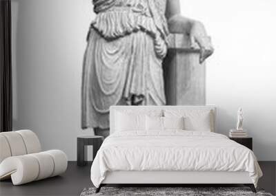 Ancient marble statue of a wounded amazon. Woman antique sculpture isolated on white background Wall mural