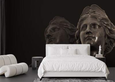 Gypsum copy of ancient statue heads on dark textured background. Plaster sculpture face Wall mural