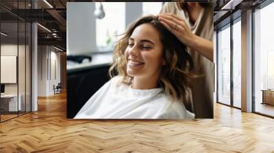 Portrait of a happy woman at the hair salon Wall mural