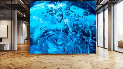 Water blue gel balls. Polymer gel. Silica gel. Balls of blue hydrogel. Crystal liquid ball with reflection. Texture background. Close up macro. Soapsuds background with air bubbles Wall mural