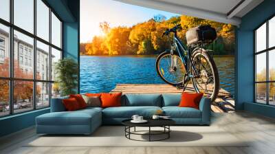 bike on the river with a bag on the trunk Wall mural