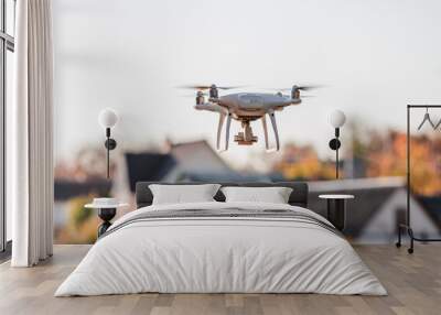 drone flying front of home Wall mural