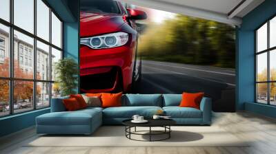 Red sport car on the asphalt road Wall mural