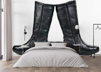 a pair of black leather women's winter boots Wall mural