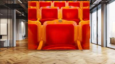 Row of red seats in theatre Wall mural