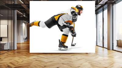 Athlete in action. Professional hockey player in the helmet and gloves on white background. Sports emotions. Hockey athlete with desire to win and be champion Wall mural