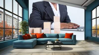 Businessman Wooden cubes on a desk in the office, Concept: Business to succeed that challenges teamwork,  design development strategy investment, symbol Financial advisor shows  to asset growth Wall mural