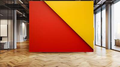 A boldly vibrant background, bisected by a striking diagonal line, divides into two contrasting halves - a luscious deep red on the left and a sumptuously rich yellow on the right Wall mural