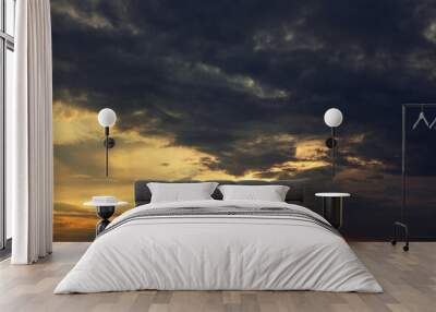 Cinematic dark clouds before storm . Dramatic sky in the twilight Wall mural