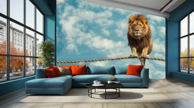 A lone lion balancing on a tightrope with a determined look in its eyes. Wall mural