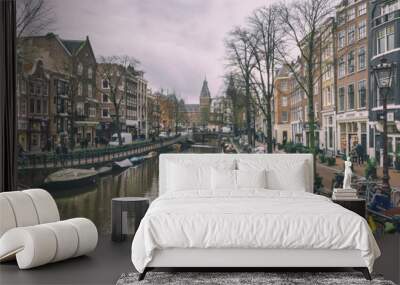 Cityscape, panorama - view of city channel with boats, city of Amsterdam, The Netherlands. Wall mural