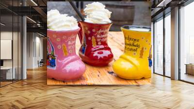 Traditional Christmas beverage - Eggnog, also known as milk punch or egg milk punch, in cup in the form of shoe with German text, translated as - Aachen Christmas Market Hexenhof, Aachen, Germany Wall mural