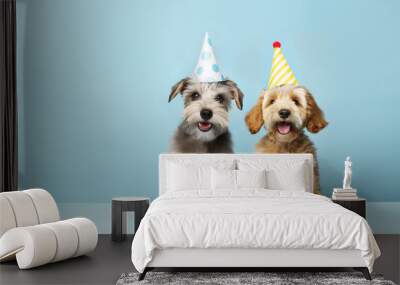 Two cute puppy dogs celebrating at a birthday party Wall mural