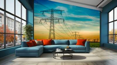 High voltage towers with thick hanging power cables in a rural landscape in the Netherlands Wall mural