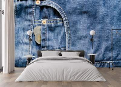 Close up Money in Front Pocket of Blue Jeans as Background Composition. Wall mural