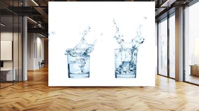 set of glasses with water splashes and falling ice cubes, isolated on white background Wall mural