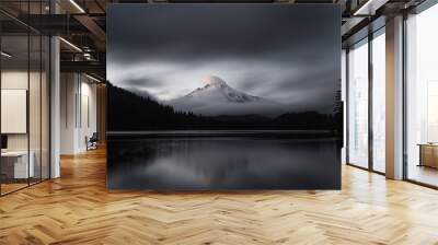 Mt Hood reflecting of Trillium lake at sunset. The last shards of light striking the clouds above its peek. Wall mural