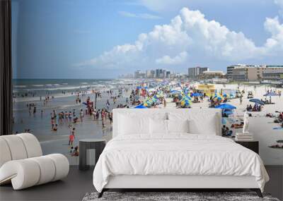 Tourists and locals packing Daytona Beach on a hot summer day on the east coast of central Florida Wall mural