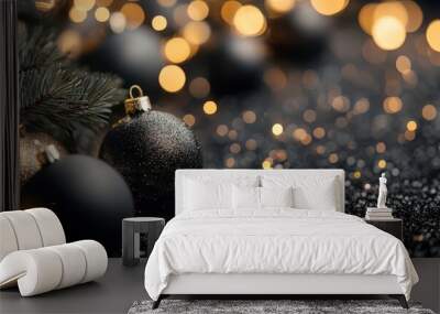 A background of black and gold Christmas decorations with glitter, blurred in the background. Wall mural