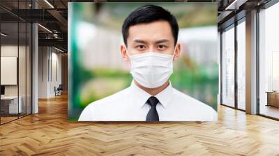 Asian man wear face mask Wall mural