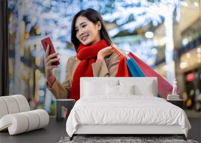 asian young woman shopping Wall mural