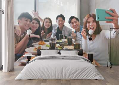 friends take selfie in restaurant Wall mural