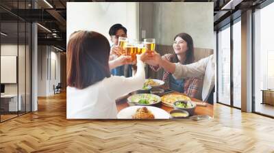 friendship toast beer in restaurant Wall mural