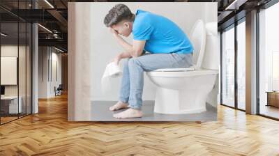 man feel pain with constipation Wall mural