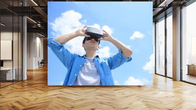 man using VR headset glasses Wall mural