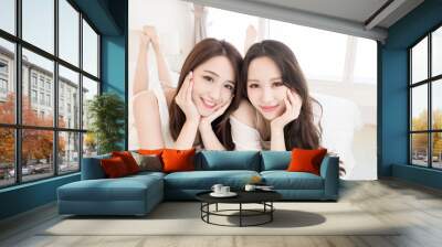 two beauty woman in home Wall mural