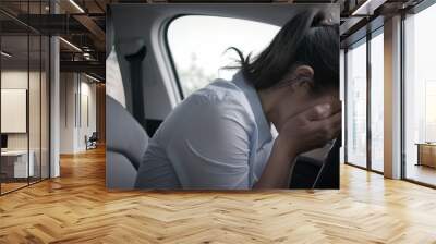 woman feel depressed in car Wall mural