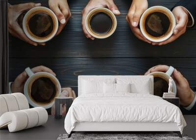 Six businesspeople taking a coffee break in an office, holding cups, engaged in lively discussion. Top view shows teamwork and collaboration. Aromatic coffee adds energy to the room Wall mural