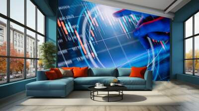 Businessman is pointing on a hi technology futuristic digital screen with financial analytics Wall mural