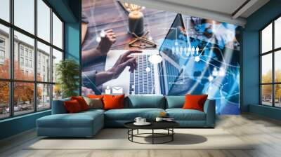 Female hands with laptop. Young woman working remotely at home. Concept of networking or remote work. Global business network. Online courses. Wall mural