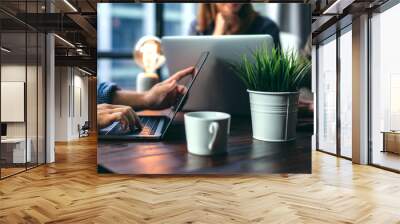 Group of young people working together. Creative business people in modern office. Hipster team in coworking. Colleagues at work. Wall mural