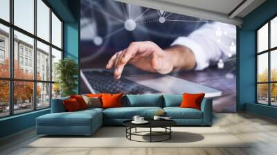 Male hands with laptop. Man working remotely at home. Concept of networking or remote work. Global business network. Online courses. Wall mural