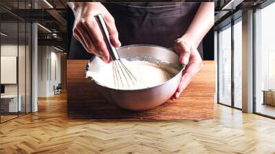 Close-up of Hands Mixing Cream in a Bowl with a Whisk Wall mural