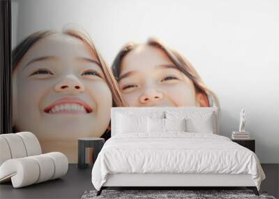 Happy young girls smiling at the camera Wall mural