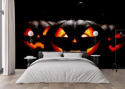 Jack-O'-Lantern With Glowing Eyes in the Dark Wall mural