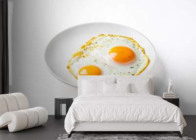 Two Fried Eggs on a White Plate Wall mural