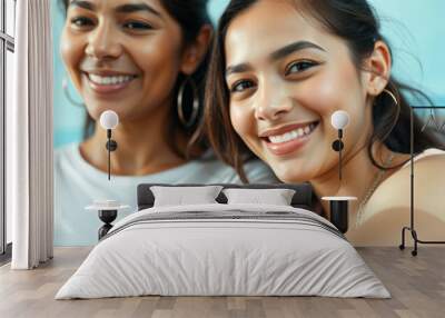 Two happy young women smiling at the camera Wall mural