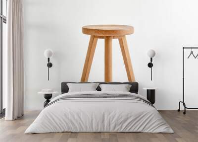 Wooden stool with three legs on white background Wall mural